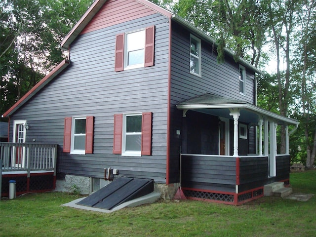 5 W Cottage Rd, Poughkeepsie, NY 12601 - rear view of property with a lawn and a deck
