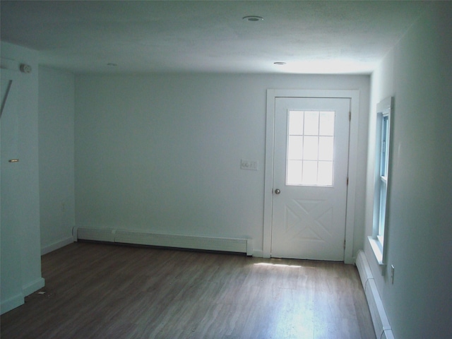 5 W Cottage Rd, Poughkeepsie, NY 12601 - entryway featuring a baseboard radiator, wood finished floors, and baseboard heating