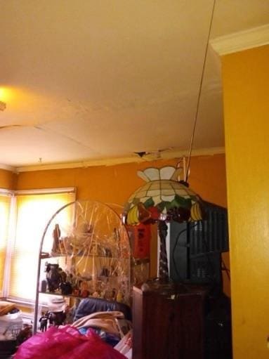 38 Allers Blvd, Roosevelt, NY 11575 - bedroom with crown molding