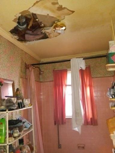 38 Allers Blvd, Roosevelt, NY 11575 - full bath with crown molding, wallpapered walls, and curtained shower