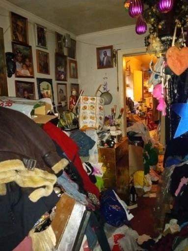 38 Allers Blvd, Roosevelt, NY 11575 - miscellaneous room featuring crown molding
