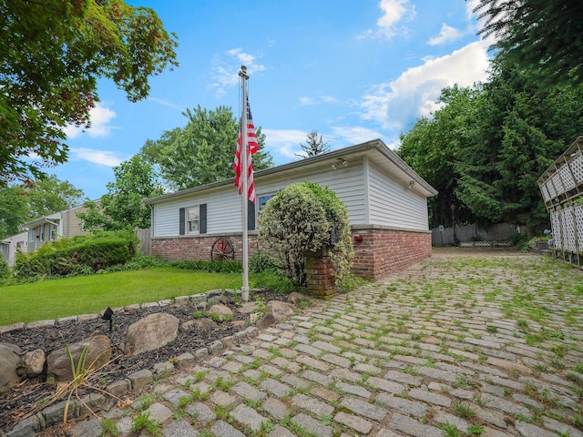 19 E Orchard St, Nanuet, NY 10954 - view of side of property with brick siding