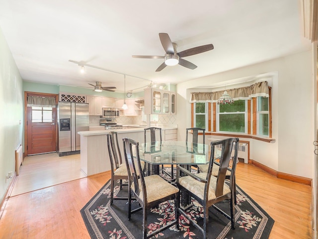 19 E Orchard St, Nanuet, NY 10954 - dining room with ceiling fan and light wood-style flooring