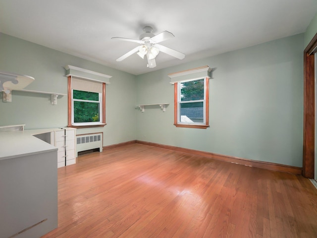 19 E Orchard St, Nanuet, NY 10954 - empty room with radiator heating unit, light wood finished floors, and ceiling fan