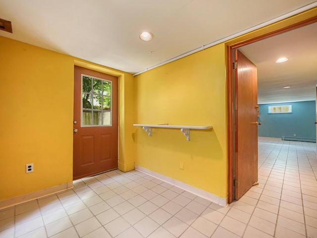19 E Orchard St, Nanuet, NY 10954 - entryway with a baseboard heating unit, recessed lighting, and light tile patterned floors
