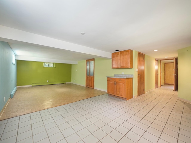 19 E Orchard St, Nanuet, NY 10954 - kitchen with baseboard heating, light countertops, open floor plan, and recessed lighting