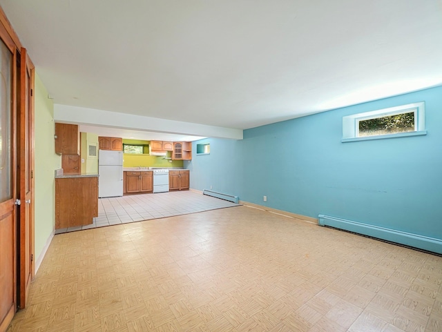 19 E Orchard St, Nanuet, NY 10954 - unfurnished living room featuring a baseboard radiator and baseboard heating