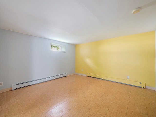 19 E Orchard St, Nanuet, NY 10954 - unfurnished room featuring a baseboard heating unit and a smoke detector