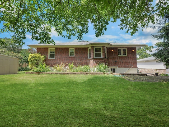 19 E Orchard St, Nanuet, NY 10954 - view of front of house featuring a front yard and brick siding