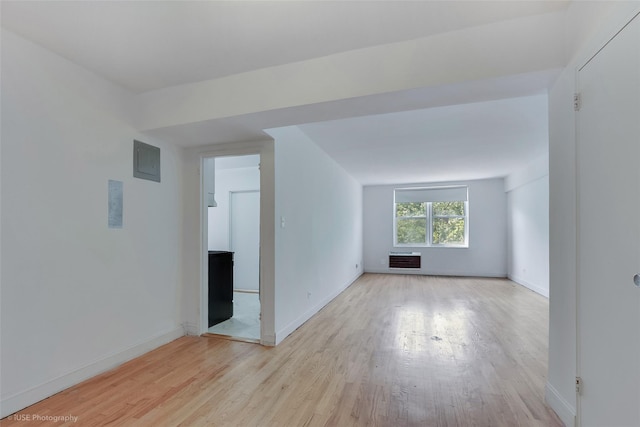 46-01 39th Ave Unit 303, Sunnyside, NY 11104 - spare room with light wood-style floors and electric panel