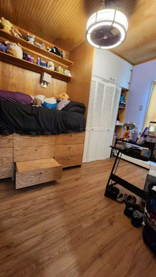 9-24 College Point Blvd, College Point, NY 11356 - bedroom featuring wood finished floors and wood ceiling