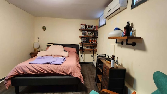 9-24 College Point Blvd, College Point, NY 11356 - bedroom featuring an AC wall unit and wood finished floors