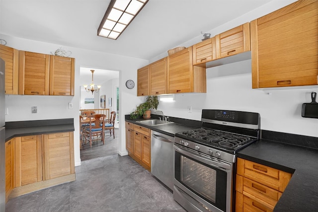 32 Spring Pond Dr, Ossining, NY 10562 - kitchen with stainless steel appliances, dark countertops, and a chandelier