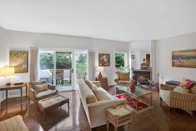 32 Spring Pond Dr, Ossining, NY 10562 - living area featuring a glass covered fireplace and wood finished floors