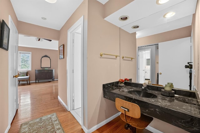 32 Spring Pond Dr, Ossining, NY 10562 - bathroom featuring wood finished floors and vanity