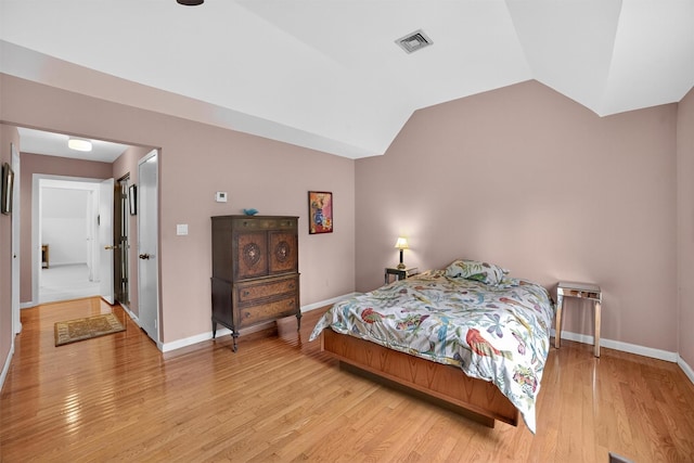 32 Spring Pond Dr, Ossining, NY 10562 - bedroom with light wood finished floors and lofted ceiling