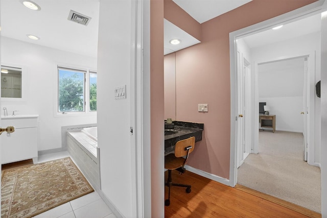 32 Spring Pond Dr, Ossining, NY 10562 - bathroom with vanity, a bath, and recessed lighting
