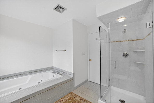 32 Spring Pond Dr, Ossining, NY 10562 - full bathroom featuring a shower stall, tile patterned flooring, and a jetted tub