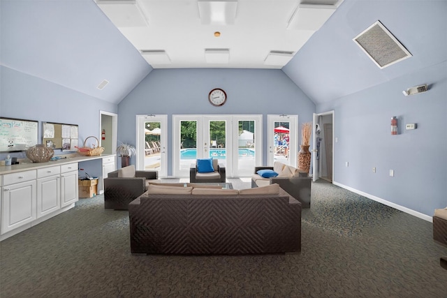 32 Spring Pond Dr, Ossining, NY 10562 - living room with dark carpet, high vaulted ceiling, and french doors