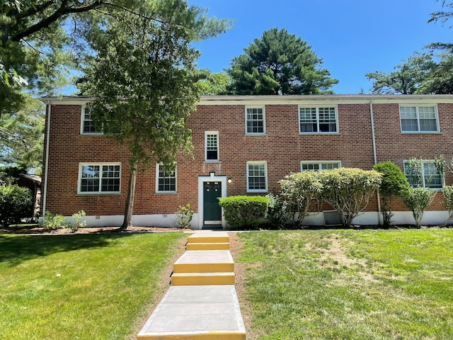 180 Pinewood Dr Unit 11, Hartsdale, NY 10530 - view of front of home with a front yard, crawl space, and brick siding