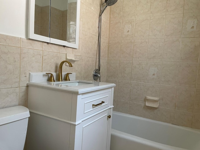 180 Pinewood Dr Unit 11, Hartsdale, NY 10530 - bathroom featuring tile walls, vanity, and shower / bath combination
