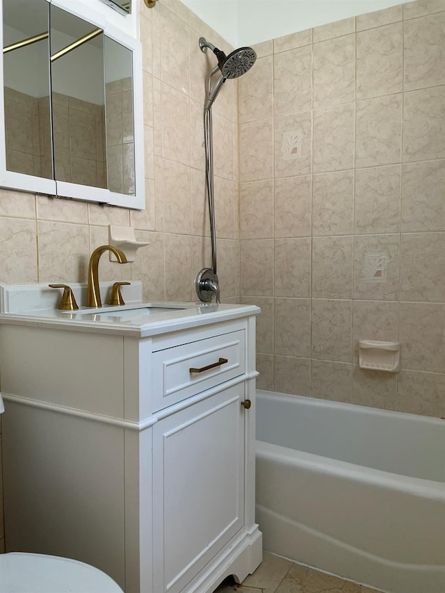 180 Pinewood Dr Unit 11, Hartsdale, NY 10530 - full bathroom featuring tile walls, vanity, and bathing tub / shower combination