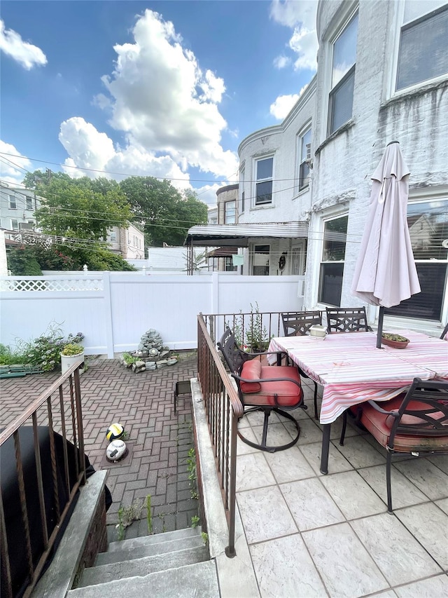 7863 79th Ln, Glendale, NY 11385 - view of patio with outdoor dining area