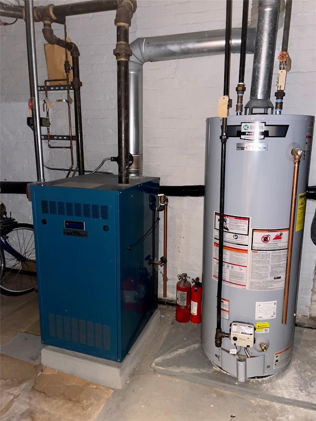 7863 79th Ln, Glendale, NY 11385 - utility room with gas water heater and a heating unit