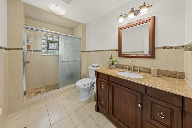 162 Airport Rd, New Hampton, NY 10958 - full bath featuring a shower stall, tile walls, vanity, tile patterned floors, and wainscoting