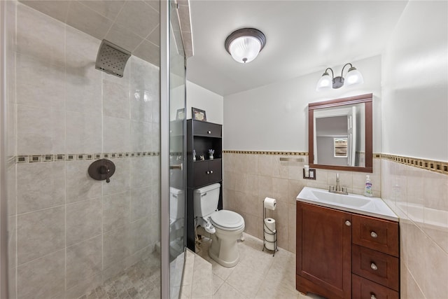 162 Airport Rd, New Hampton, NY 10958 - bathroom with tile walls, a stall shower, vanity, tile patterned flooring, and a wainscoted wall