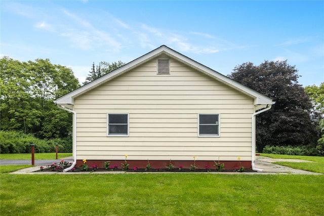 162 Airport Rd, New Hampton, NY 10958 - view of home's exterior featuring a lawn