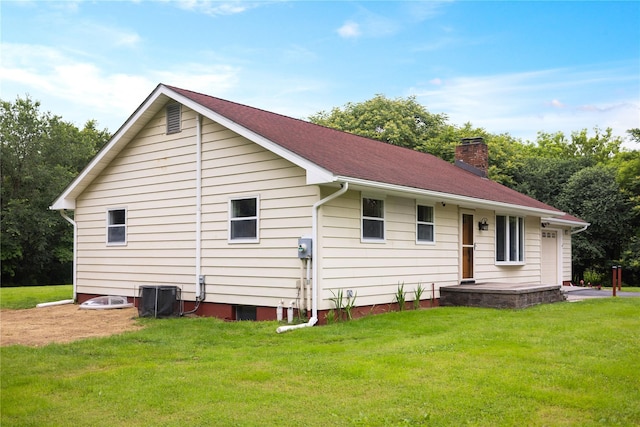 162 Airport Rd, New Hampton, NY 10958 - rear view of house with a chimney and a lawn