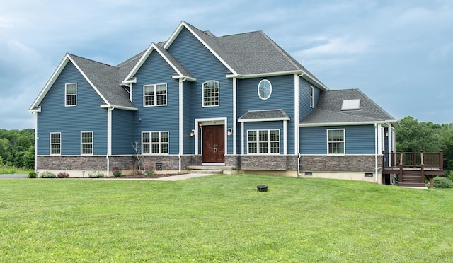 45 Jeffrey Dr, Pleasant Valley, NY 12569 - view of front of property with a front yard, a wooden deck, stone siding, and roof with shingles