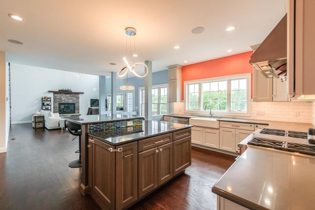 45 Jeffrey Dr, Pleasant Valley, NY 12569 - kitchen with extractor fan, dark wood finished floors, backsplash, open floor plan, and recessed lighting
