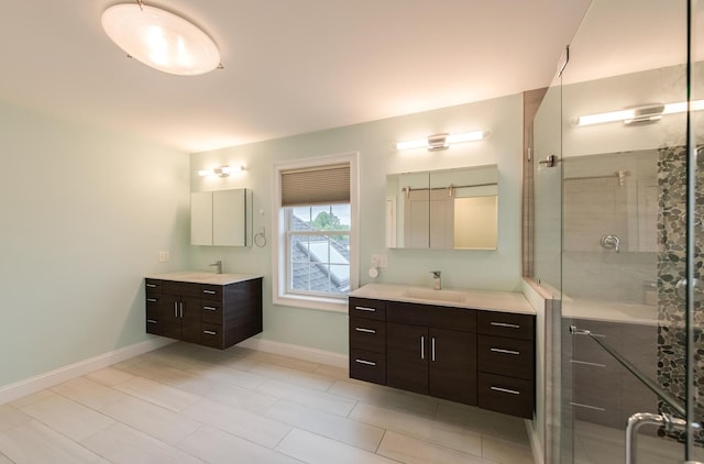 45 Jeffrey Dr, Pleasant Valley, NY 12569 - bathroom featuring two vanities, a stall shower, and tile patterned floors