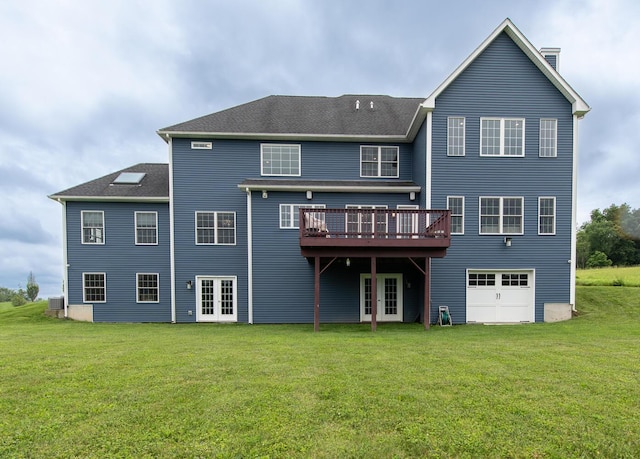 45 Jeffrey Dr, Pleasant Valley, NY 12569 - back of house featuring french doors, a yard, a deck, and a garage