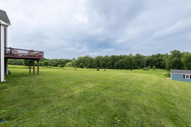 45 Jeffrey Dr, Pleasant Valley, NY 12569 - view of green lawn featuring a wooden deck and an outdoor structure