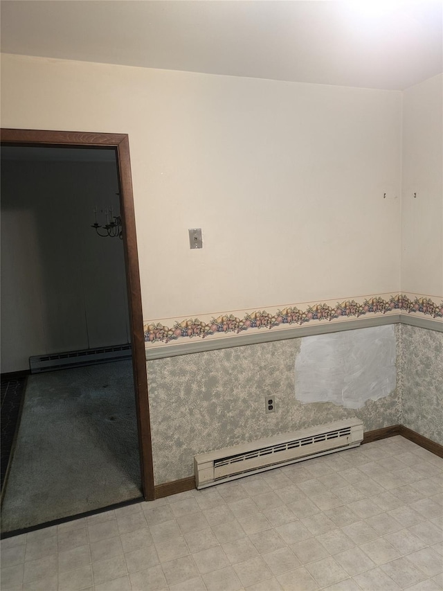24 Delilah Ln, Plattekill, NY 12589 - bathroom featuring a baseboard radiator, baseboard heating, tile patterned floors, wainscoting, and wallpapered walls