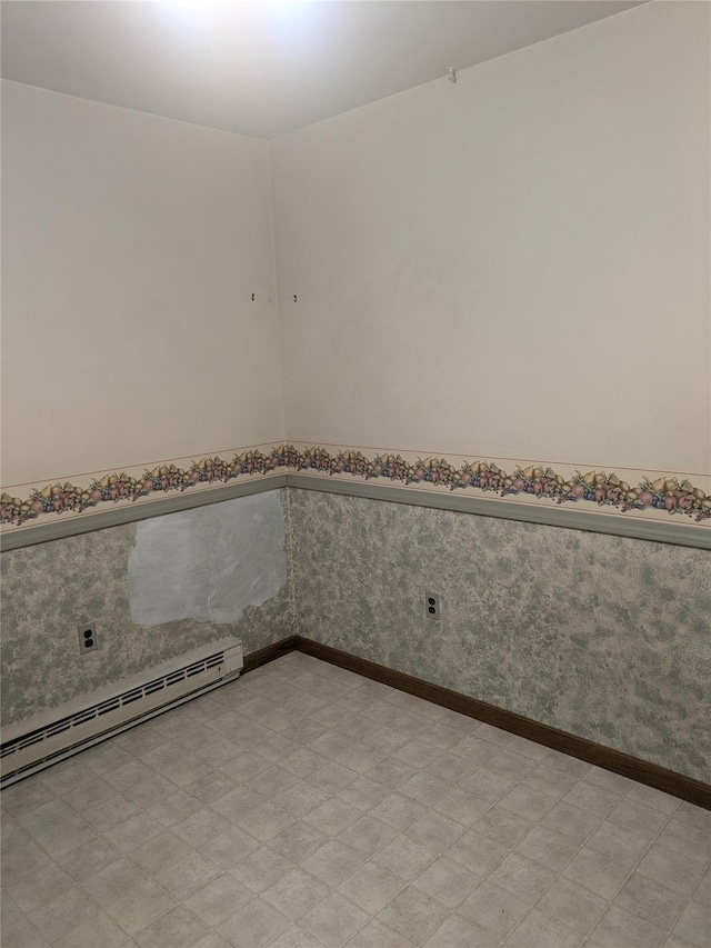 24 Delilah Ln, Plattekill, NY 12589 - spare room featuring light flooring, baseboard heating, and a wainscoted wall