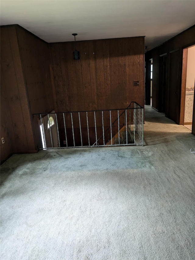 24 Delilah Ln, Plattekill, NY 12589 - unfurnished living room with light carpet and wooden walls