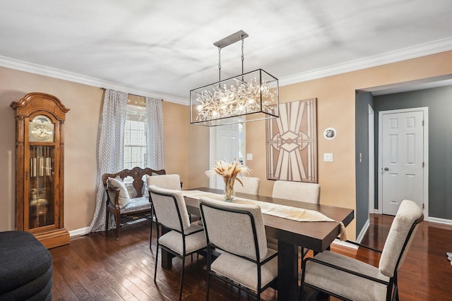 55 Winterberry Cir, Cross River, NY 10518 - dining area with dark wood finished floors, a chandelier, and crown molding