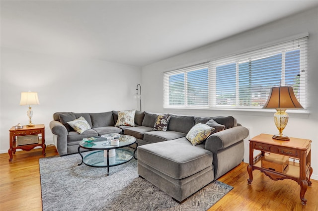 318 W Cortland Ave, Oceanside, NY 11572 - living area with light wood-style flooring and baseboards