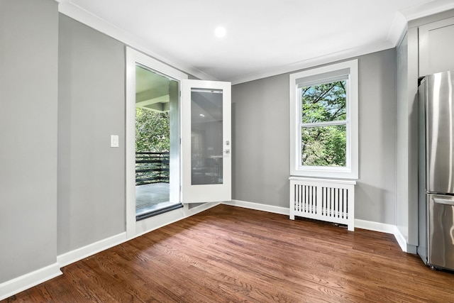 1133 Midland Ave Unit 4E, Bronxville, NY 10708 - empty room featuring radiator, wood finished floors, ornamental molding, healthy amount of natural light, and recessed lighting