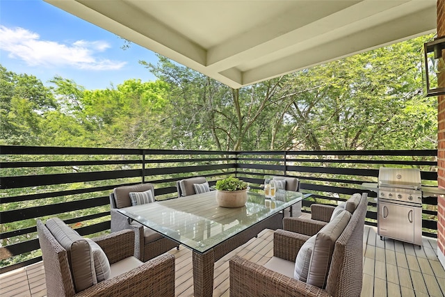 1133 Midland Ave Unit 4E, Bronxville, NY 10708 - wooden terrace with outdoor dining area, view of scattered trees, and a grill
