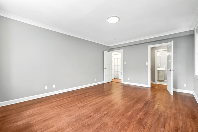1133 Midland Ave Unit 4E, Bronxville, NY 10708 - unfurnished bedroom featuring crown molding, wood finished floors, and ensuite bathroom