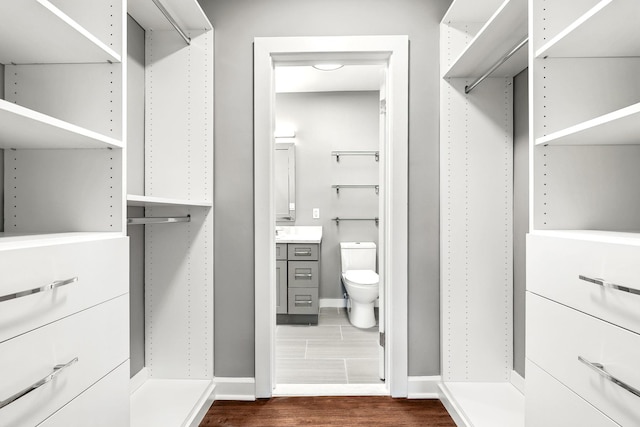 1133 Midland Ave Unit 4E, Bronxville, NY 10708 - spacious closet featuring dark wood-style floors