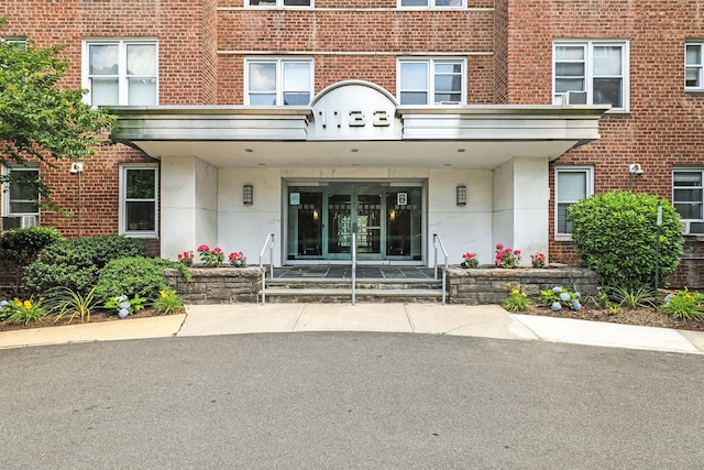 1133 Midland Ave Unit 4E, Bronxville, NY 10708 - entrance to property featuring stucco siding and brick siding