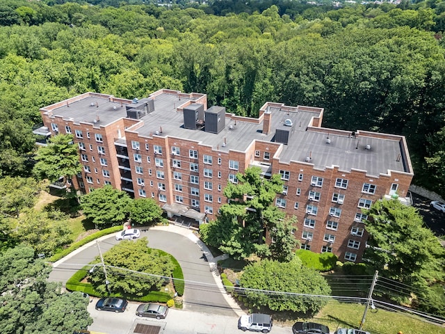 1133 Midland Ave Unit 4E, Bronxville, NY 10708 - drone / aerial view of a forest