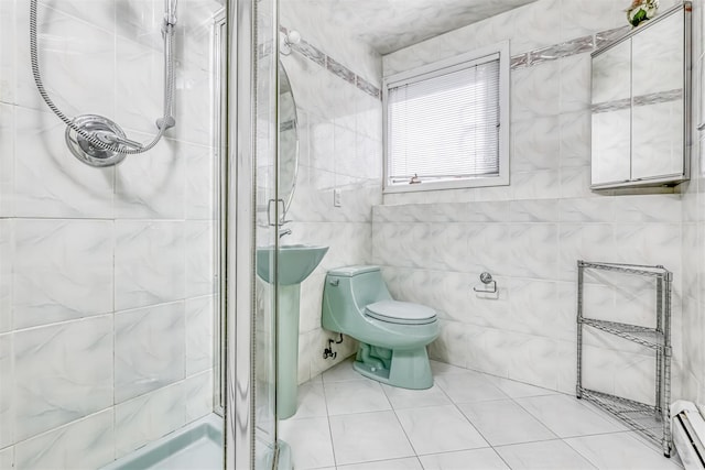 41 N Quince Ln, Monsey, NY 10952 - bathroom featuring a stall shower, a baseboard radiator, and tile patterned floors