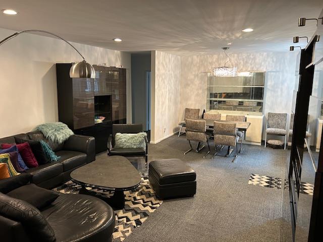 257 Cedarhurst Ave Unit A 8, Cedarhurst, NY 11516 - carpeted living room featuring recessed lighting